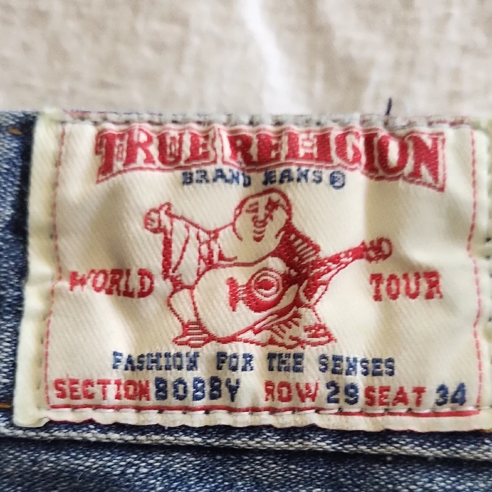 True Religion Denim Jeans With Yellow Accent Pocket. Row 29 Seat 34